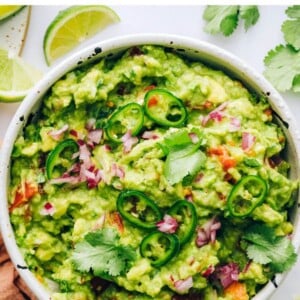 An overhead view of a serving bowl of guacamole.